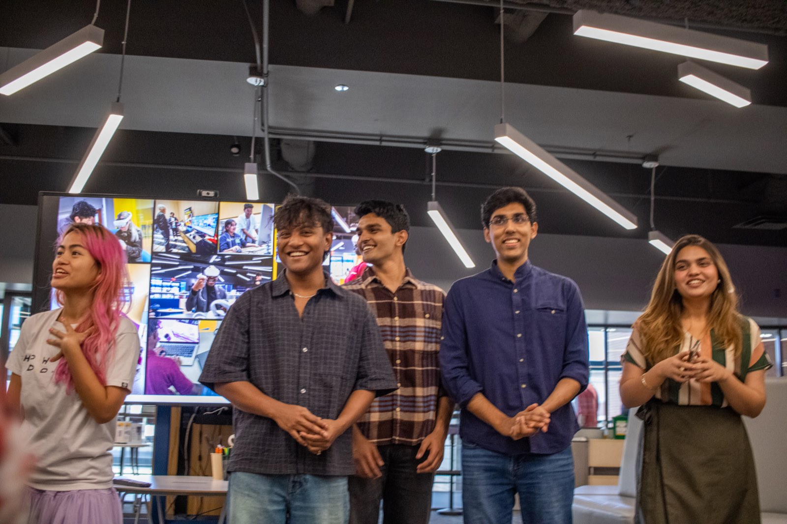 Students laughing during a session at ASU Next Lab
